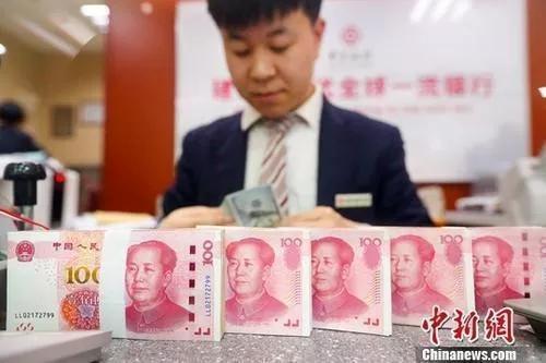 資料圖：銀行工作人員清點貨幣。<a target='_blank' href='/'>中新社</a>記者 張云 攝